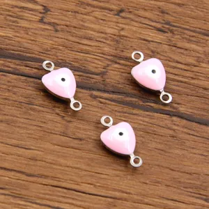 Stainless steel pink heart evil eye connector charm for DIY bracelet jewelry making details.