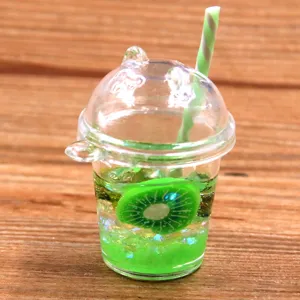 Miniature resin kiwi fruit cup charm, detailed DIY craft accessory close-up display.