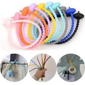 Silicone twist ties detail showing flexible cable management and secure locking mechanism.