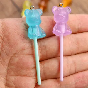 Luminous resin bear lollipop charms for DIY jewelry making, phone case pendants and bags.