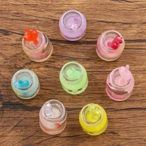 Colorful 15x34mm DIY resin bottle pendants with cute expression and heart straw charms.