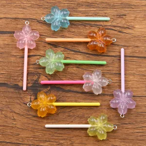Colorful resin flower lollipop pendants DIY acrylic charms for phone cases and bags decoration.