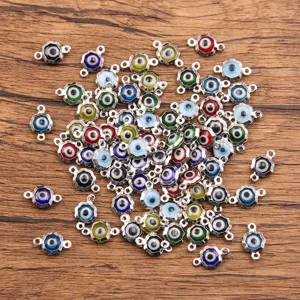 Connecteurs breloques fleur œil maléfique en acier inoxydable pour fabrication de bijoux.