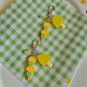 Cute fruit tanghulu beaded phone charm, summer fresh simulation fruit bag hanging pendant.