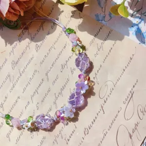 Bracciale intrecciato in cristallo viola originale con fiori delicati e tasca a rete.