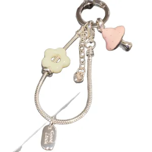 Simpatico portachiavi con catena d'argento e fungo rosa ciondolo borsa regalo amica