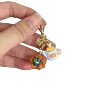 Handmade cute teapot and berry pastry keychain charm, perfect bag pendant and accessory.