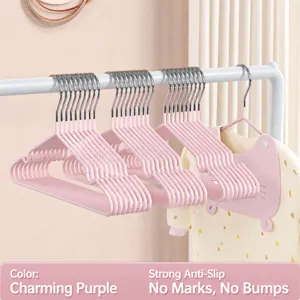 Pink stainless steel non-slip clothes hangers for durable home wardrobe storage use.