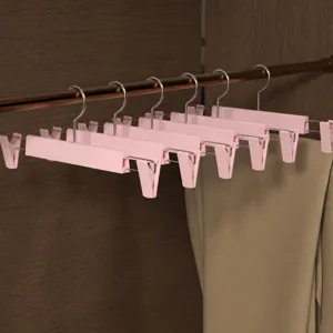 Rosa Kunststoff Hosenbuegel rutschfeste Rockclips fuer Kleiderschrank Aufbewahrung und Ordnung