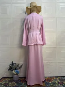 Elegant solid color long sleeve top and long skirt set for women, comfortable spring wear detail