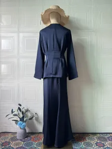 Solid color long sleeve top and long skirt set, elegant vintage style, comfortable spring outfit.