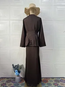 Vintage solid color long sleeve top and long skirt set for women, comfortable spring style.