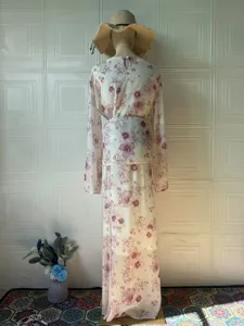 Floral long sleeve dress detail showing back design, elegant vintage style for women summer.