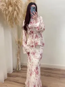 Floral long sleeve top and long skirt set for women, elegant vintage two piece outfit.