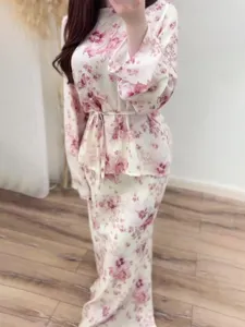 Women's vintage floral two-piece set, long sleeve top and long skirt, elegant summer outfit.