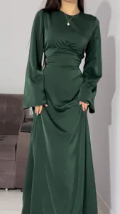 Elegant dark green satin maxi dress with long sleeves and cinched waist for women.