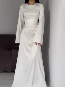 Elegant women's long sleeve satin maxi dress, solid color waist-cinching design for spring.