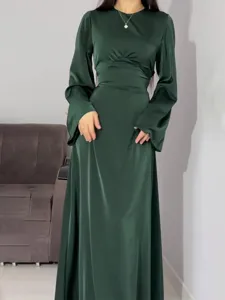 Elegant dark green long sleeve maxi dress with waist tie, perfect for spring fashion.