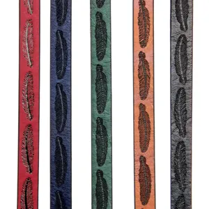 Detailed view of embossed feather PU leather cord straps, perfect for DIY bracelets and accessories.