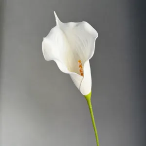Close-up detail of artificial white calla lily flower, perfect for home decor and floral arrangement.