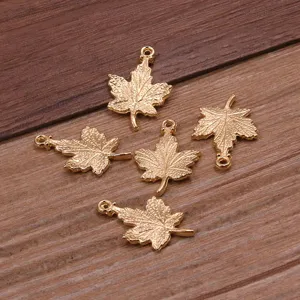 Gold maple leaf charm detail shot, alloy jewelry connector for DIY bracelet and necklace.