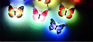 Colorful LED butterfly wall night light, glowing room decor lamp, adhesive sticker design.