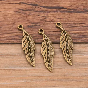 Antique bronze leaf metal pendant charm DIY jewelry accessory detail view close up display
