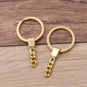 Gold keychain ring detail view, 30mm metal split ring with short chain for DIY jewelry crafting.