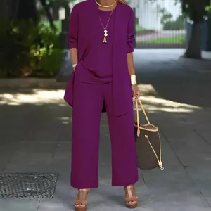 Stylish plus size women's three piece pants set featuring cardigan, top and trousers.
