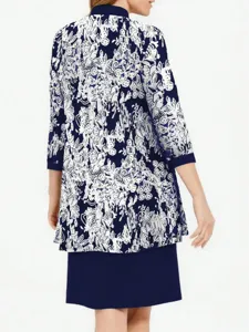 Back view detail of blue and white printed three-quarter sleeve cardigan jacket and matching dress.