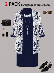 Detailed view of the elegant two-piece set with a printed cardigan and sleeveless dress.