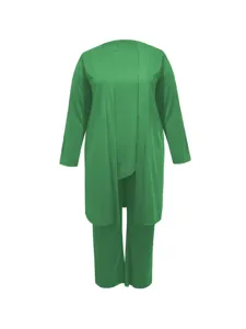 Detail view of the green three-piece women set featuring cardigan top and trousers.