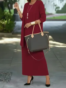 Elegant women's solid color three-piece skirt set featuring a stylish long cardigan and top.