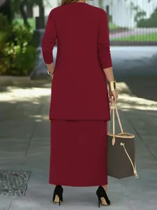 Wine red plus size three-piece skirt set elegant long sleeve outfit detail view.