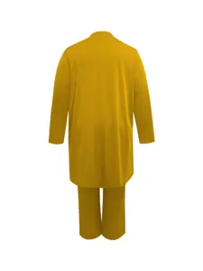 Back view of yellow long sleeve tunic top and pants set detail showing simple solid design.