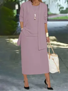 Detailed view of the elegant plus size solid color three piece skirt set in a stylish mauve.