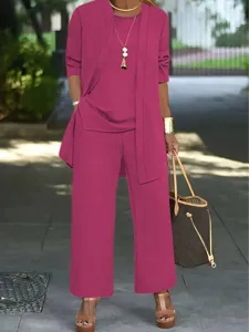 Elegant women's three-piece pants set with stylish cardigan and comfortable loose trousers.