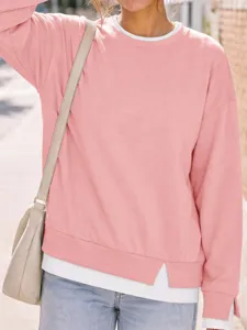 Felpa casual rosa da donna con girocollo e maniche lunghe, dettaglio top ampio.
