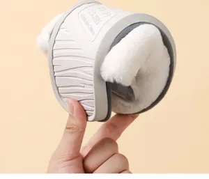 Close-up detail of soft winter plush cotton slipper sole showing flexibility and cozy fur lining.