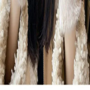 Winter warm fuzzy plush jacket detail shot with cozy shearling texture and metal zipper closure.