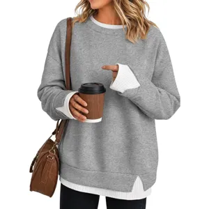 Felpa girocollo da donna a maniche lunghe patchwork pullover casual largo vista frontale