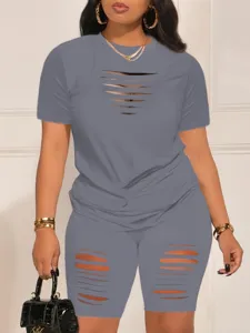 Grey cutout short sleeve top and shorts matching two-piece summer outfit detail view