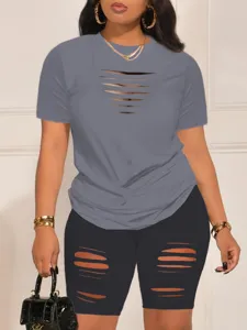 Detail view of women summer casual cutout t-shirt and shorts set with stylish design.