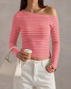Close-up view showcasing the casual striped off-the-shoulder long sleeve top in pink and red.