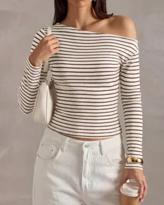 Detailed view of the stylish striped one-shoulder long sleeve top for women. Perfect style.