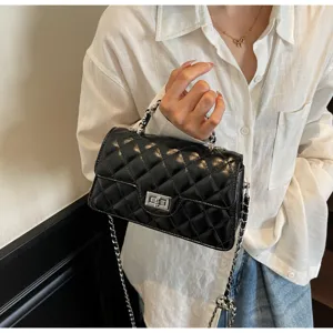 Black quilted shoulder bag for women, stylish chain crossbody bag with turn lock.