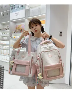 Niedlicher pinker Rucksack und Tragetasche mit Sternenmuster und klarem Fach für Schule.