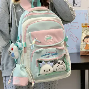 Pastellfarbener Colorblock Schulrucksack mit mehreren Fächern und Vorderfach für Alltag.