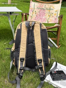 Stylish color-blocked outdoor backpack, lightweight casual daypack for travel and hiking.