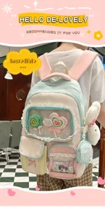 Süßer pastellfarbener Farbblock-Schulrucksack mit süßem Hasenanhänger und Fächern.